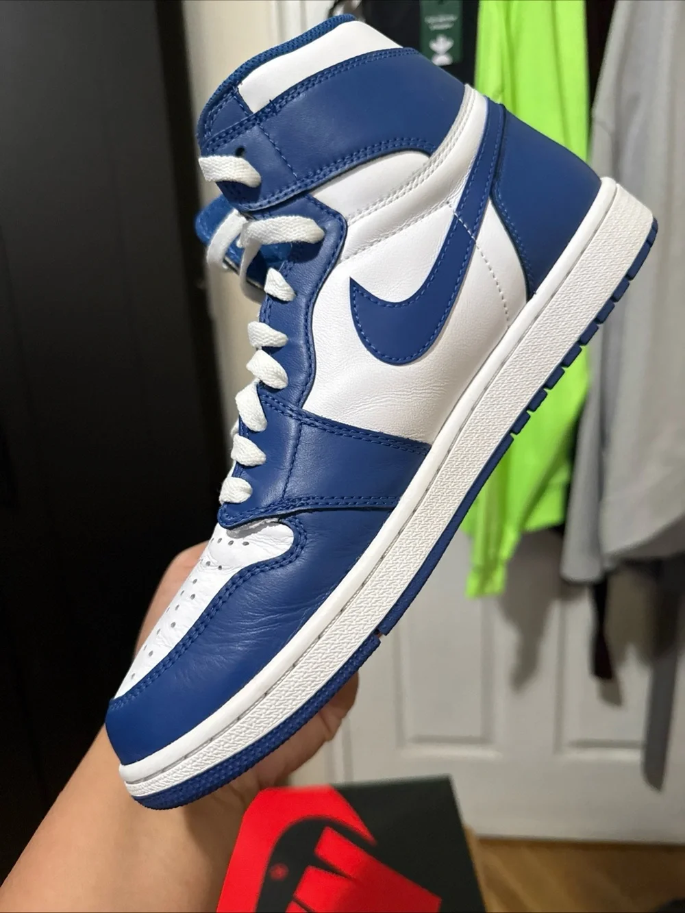 Jordan Air Jordan 1 Mid White and Blue Sneakers
